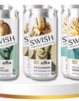 Four cans of Swish liqueur cocktails on a white stand with a gold base.