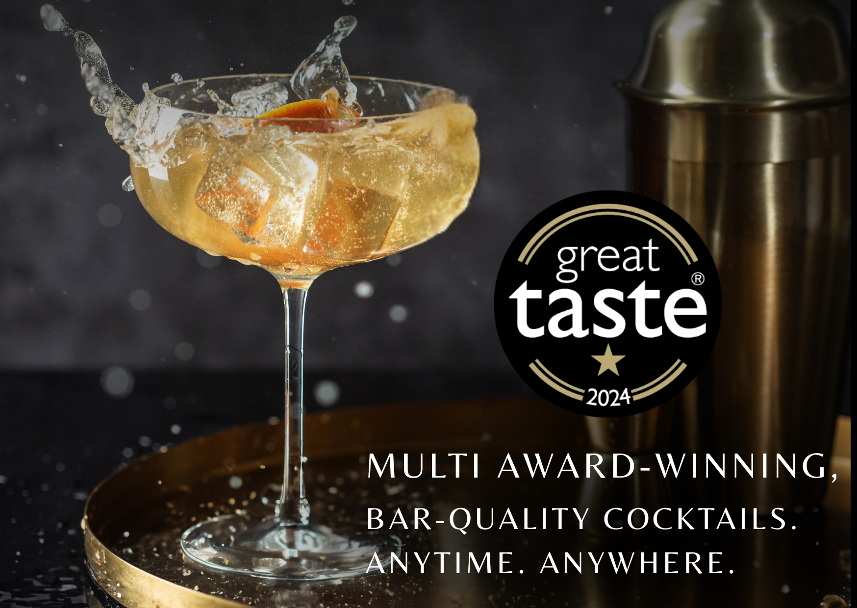 Cocktail glass with ice and a splash, next to a cocktail shaker, on a dark background with 'Great Taste' logo.